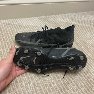 Black Nike women’s soccer cleats. Size women’s 9